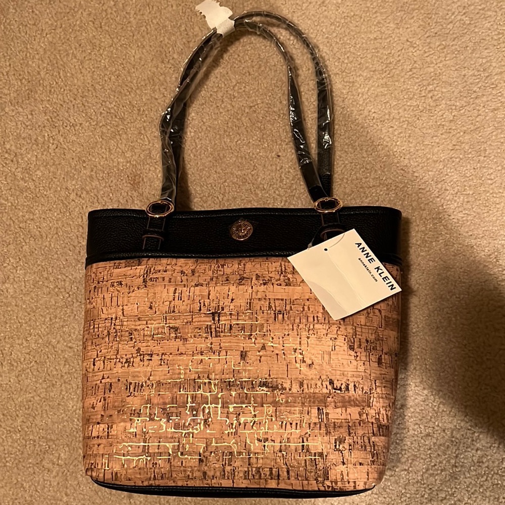Anne Klein new tote!!! Never been used. Black an cork- like outside.